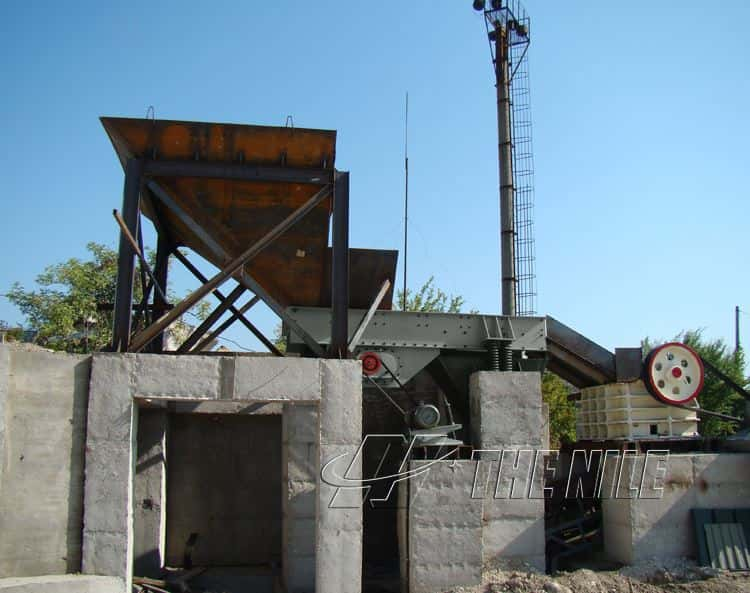 Vibrating feeder work site