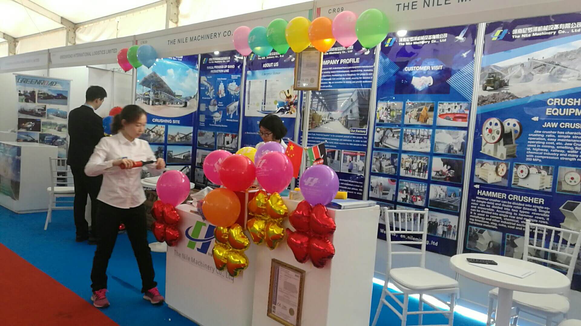 The employees are busy decorating the exhibition hall